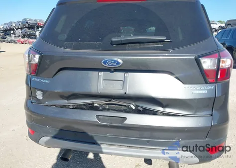 2018 Ford Escape Titanium z USA, uszkodzony, nr VIN 1FMCU0J95JUB36676